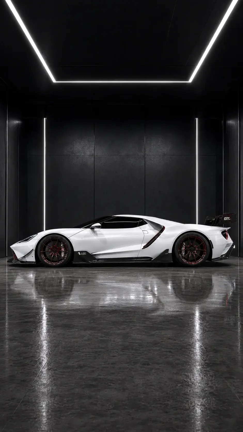 Ford GT side profile in the same dark studio